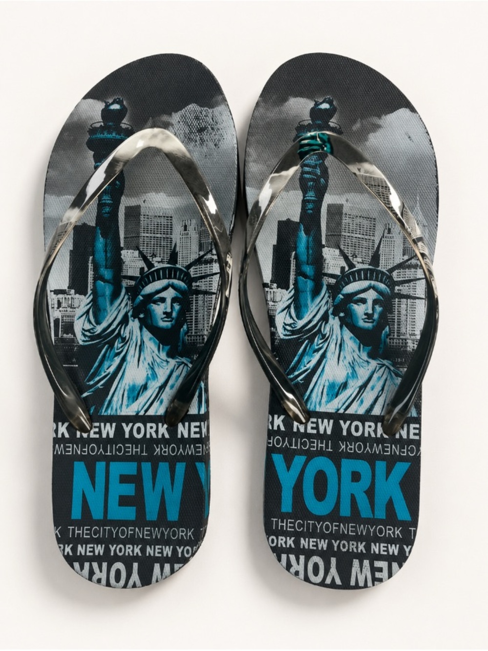 New York & Company Black and Teal Statue of Liberty Flip Flop Sandals